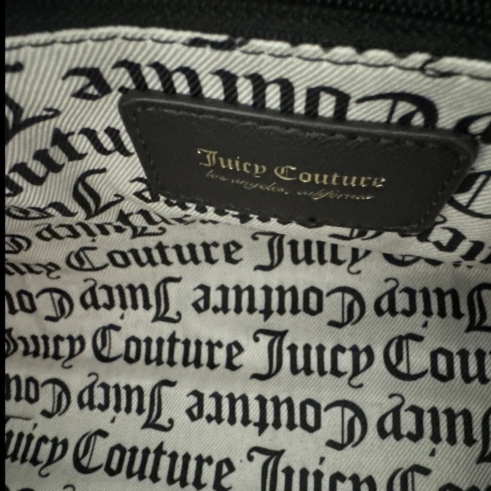 JUICY COUTURE SOFT PINK SATCHEL WITH BLACK ACCENTS